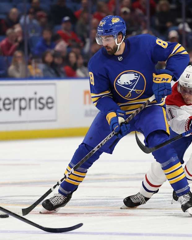 Oct 27, 2022; Buffalo, New York, USA; Montreal Canadiens right wing Brendan Gallagher (11) defends as Buffalo Sabres right wing Alex Tuch (89) controls the puck during the second period at KeyBank Center. Mandatory Credit: Timothy T. Ludwig-USA TODAY Sports